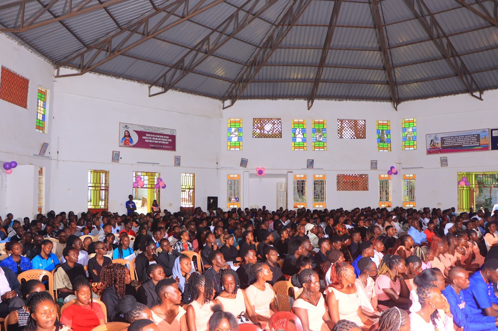 Catholic students welcoming first-years outside St. Anne's Chaplaincy at Maseno University